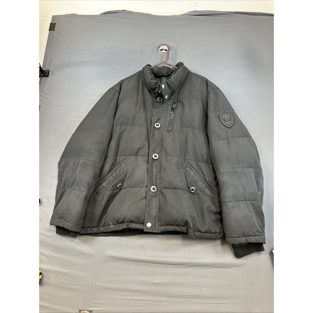 black Calvin Klein puffer jacket features branded buttons Size Xl